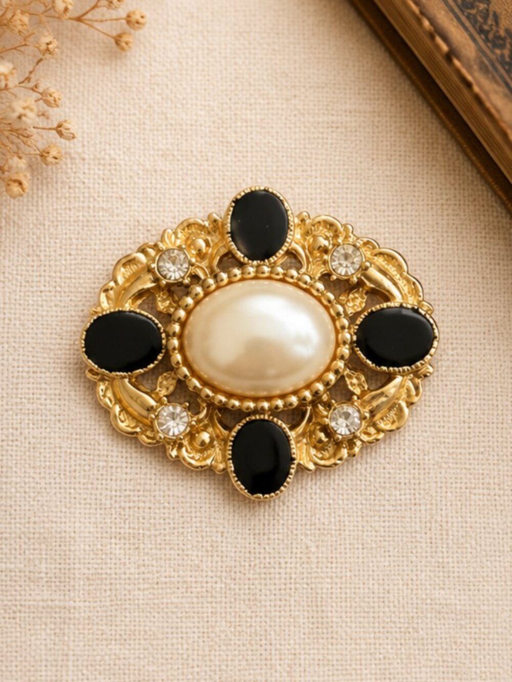 Vintage AVON Gold Tone Brooch with Faux Pearl, Black Cabochons & Rhinestones
